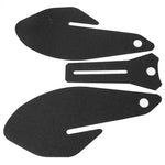 Individual pad pieces laid flat showing textured rubber surface